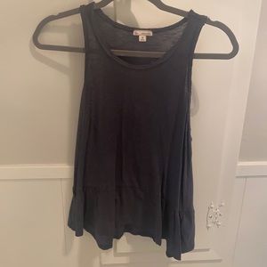 Blue peplum sleeveless top